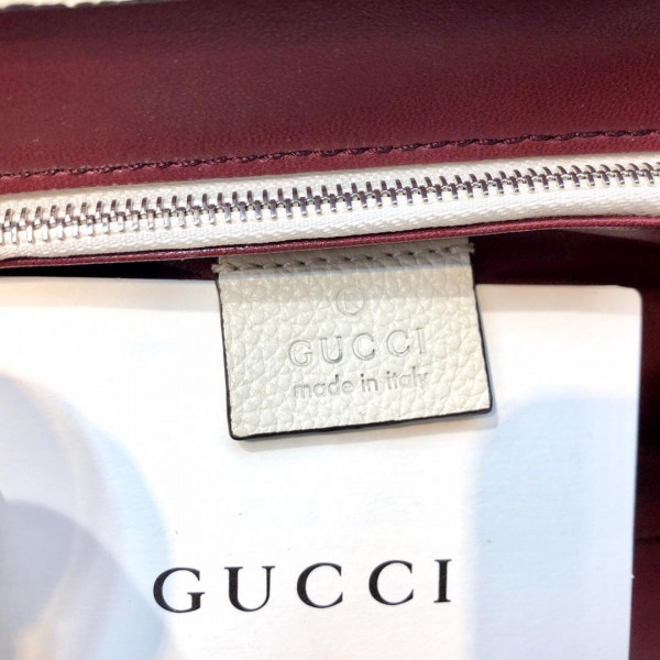 G*u*i zumi grainy leather small top handle bag