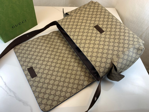 G*u*i gg plus diaper bag