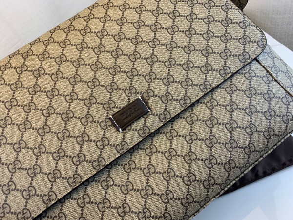 G*u*i gg plus diaper bag