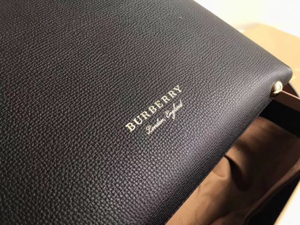 B**rry the small banner in leather and house check