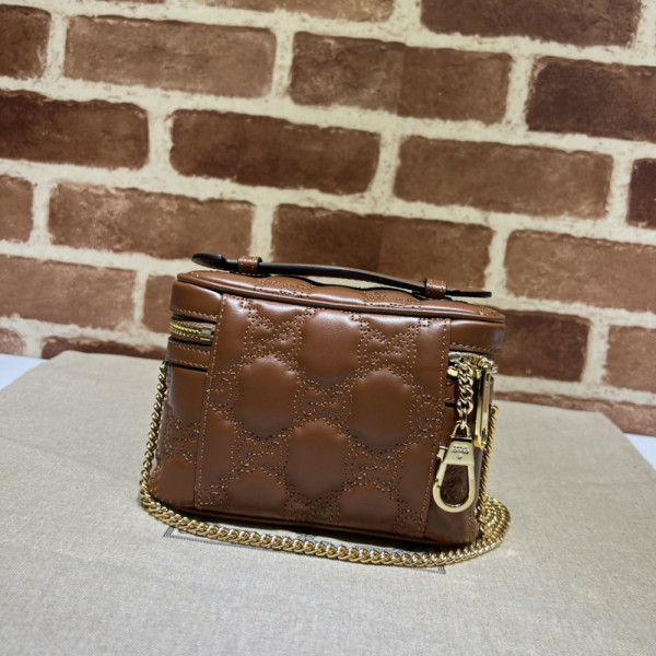 G*u*i gg matelassé top handle mini bag