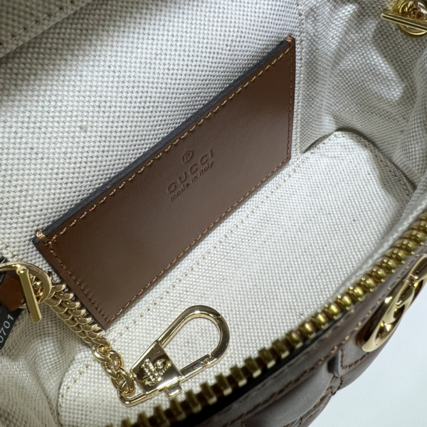 G*u*i gg matelassé top handle mini bag